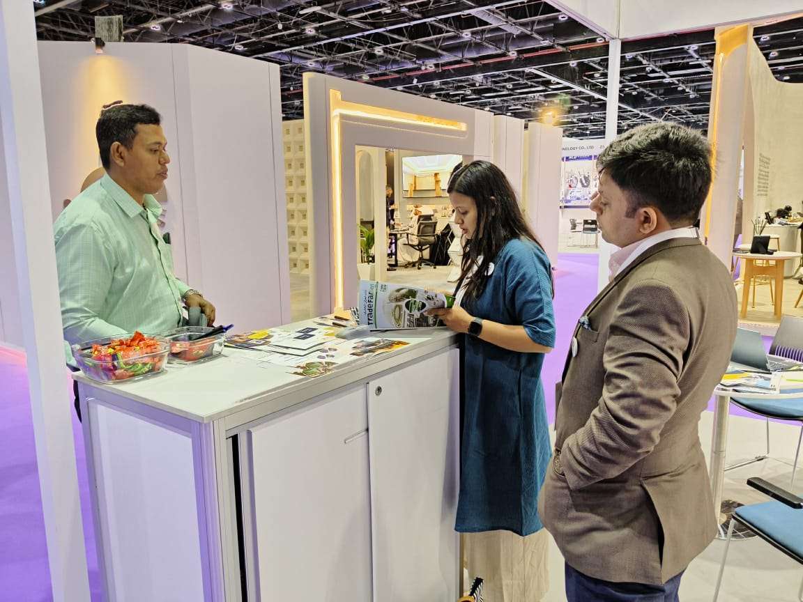 a group of people standing at a counter